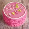 pink flora first birthday cake